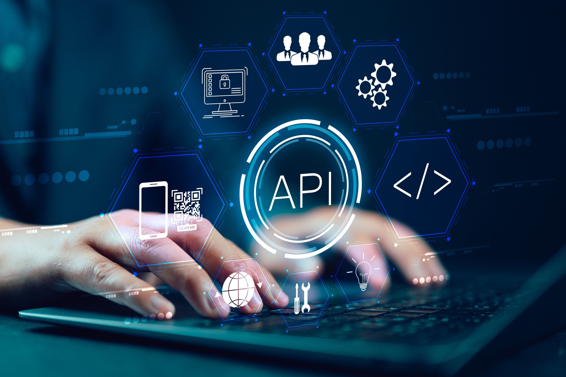 Businessman using laptop with API icon on a virtual screen in the background of technology device internet, API Application Programming Interface connects services on the internet data communication.